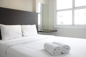 Cozy High Floor 1BR Apartment at Parahyangan Residence By Travelio